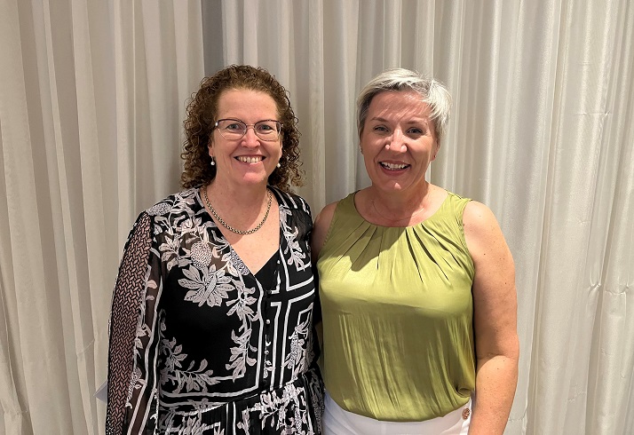 Carol and Irene are all smiles at the award ceremony.