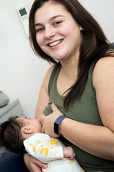 Woman breastfeeding baby